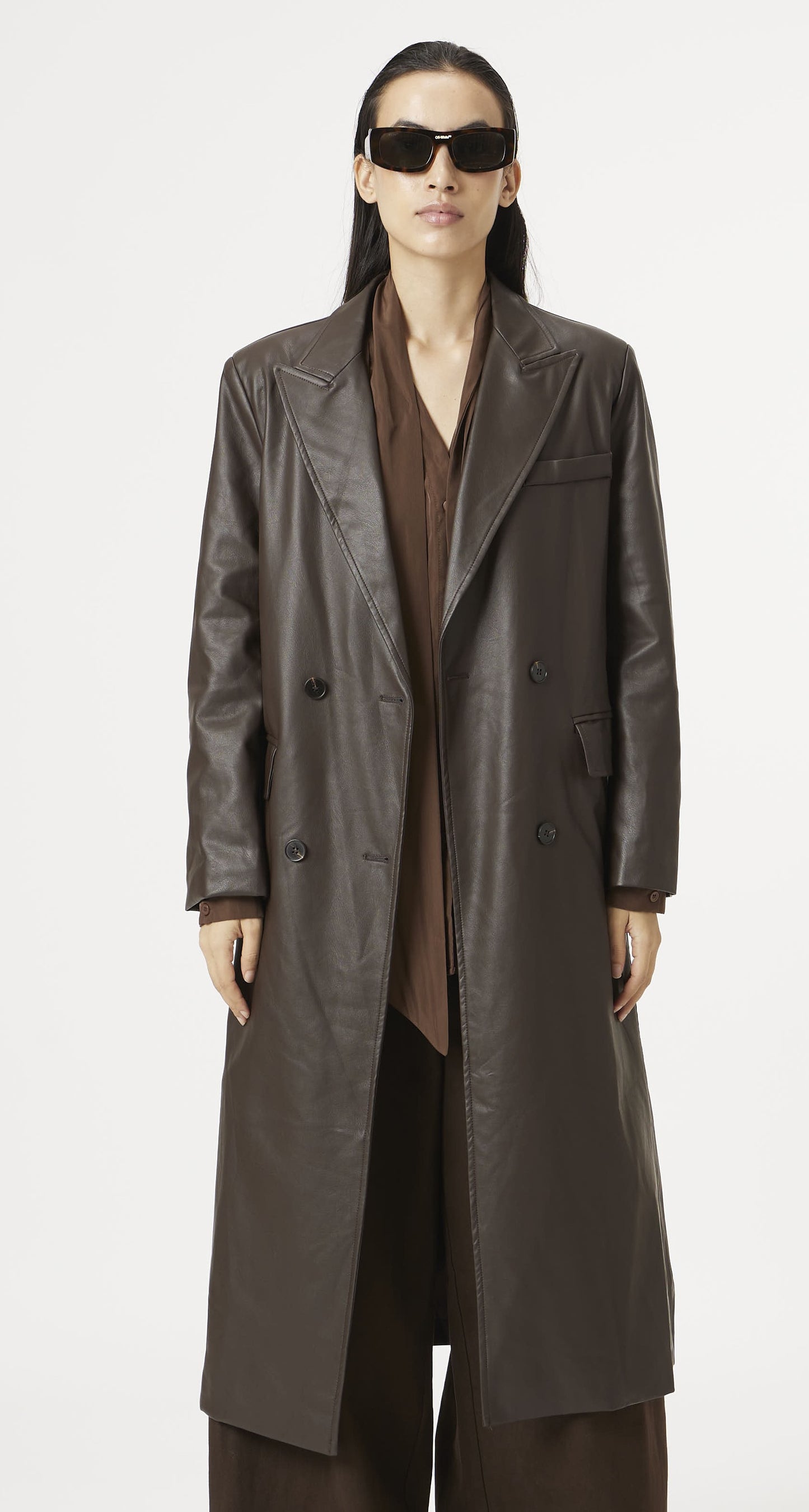 brown runway rain trench