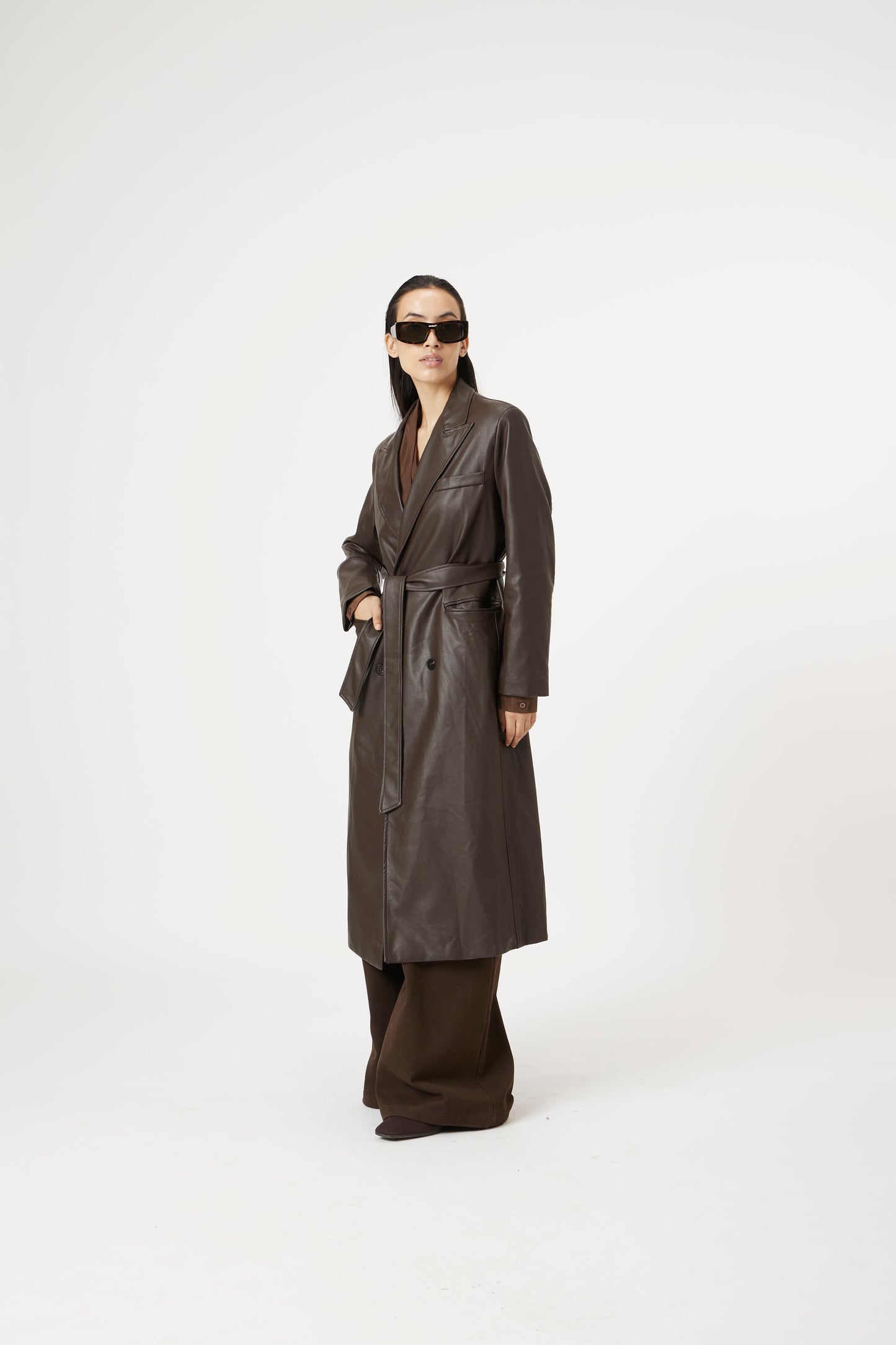 brown runway rain trench
