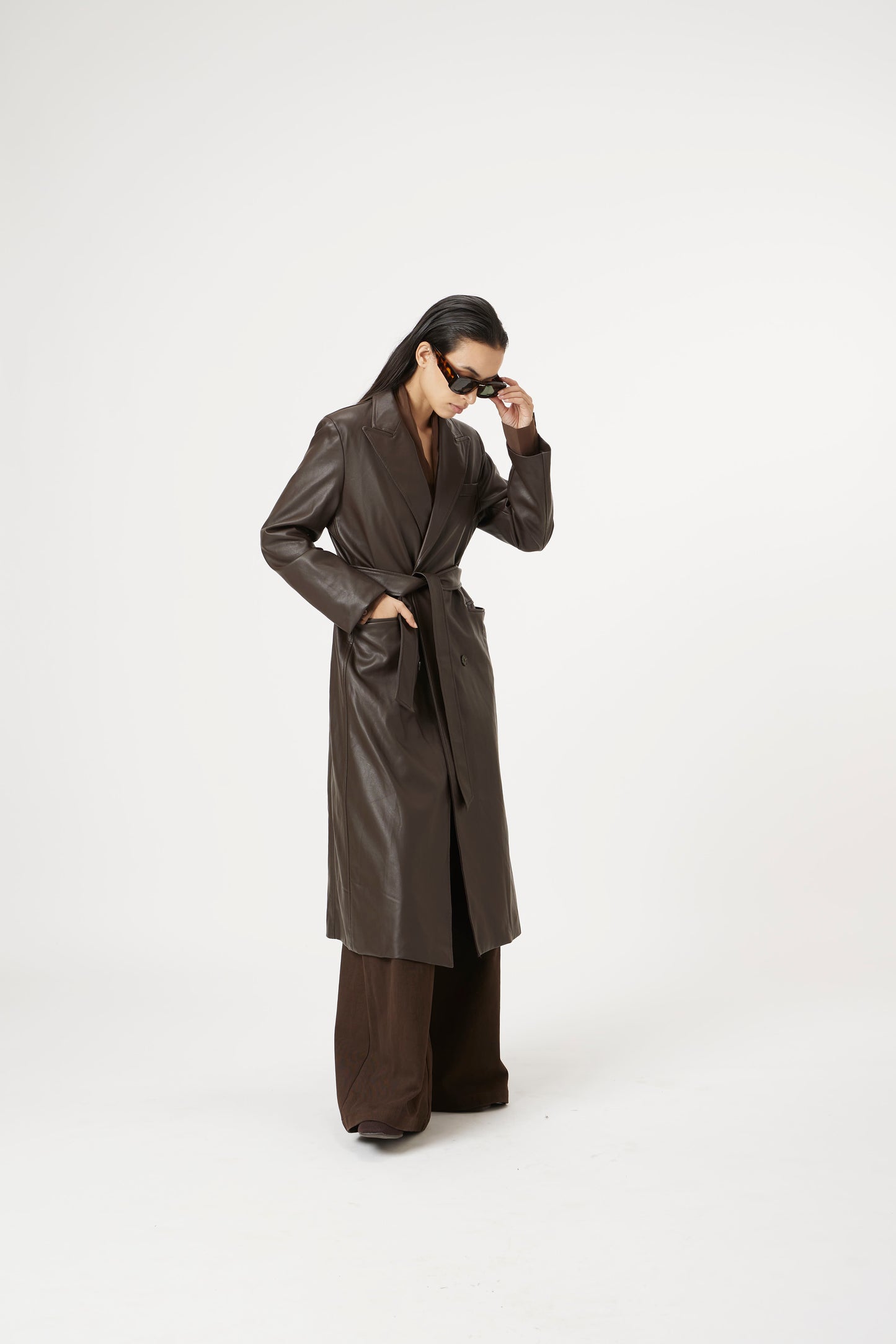 brown runway rain trench